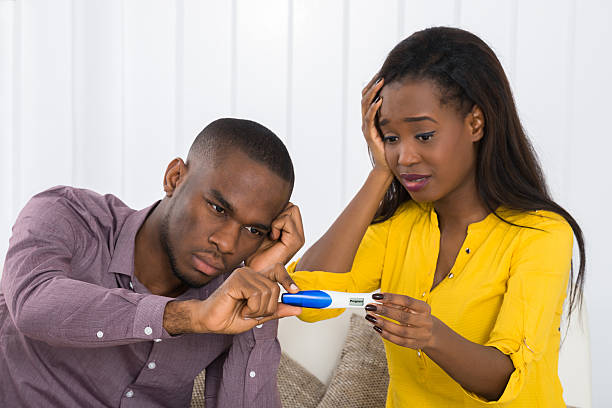 young_couple_worried_about_home_pregnancy_test